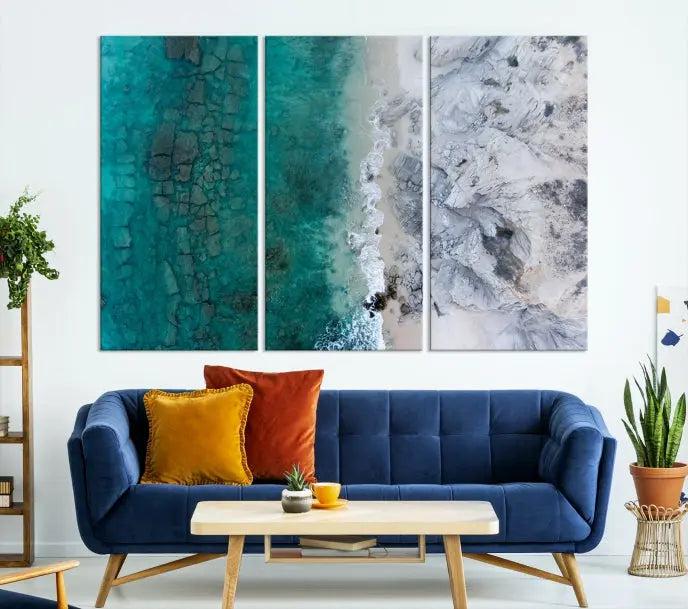 The Green Aerial Ocean Wall Art Canvas Print showcases a triptych of an aerial ocean view. Crafted on museum-quality canvas with gallery-wrapped edges and a UV-protective coating, it enhances both elegance and durability in your space.