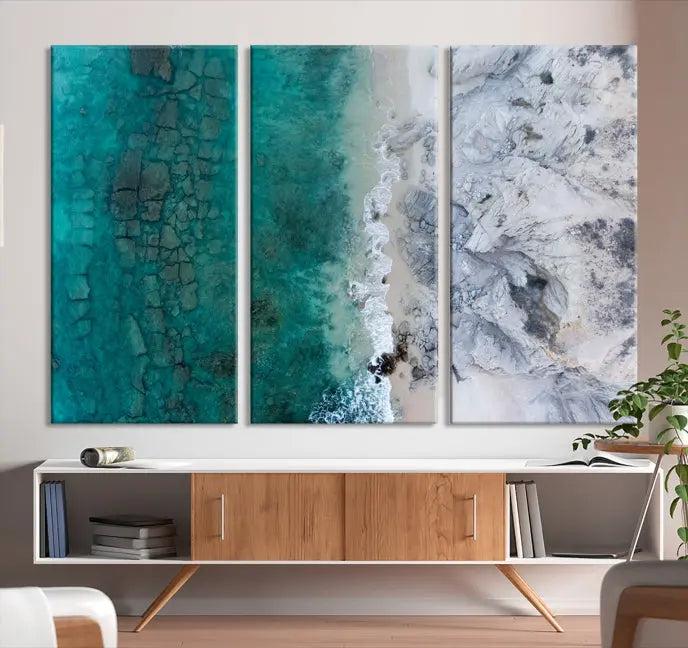 The Green Aerial Ocean Wall Art Canvas Print showcases a triptych of an aerial ocean view. Crafted on museum-quality canvas with gallery-wrapped edges and a UV-protective coating, it enhances both elegance and durability in your space.