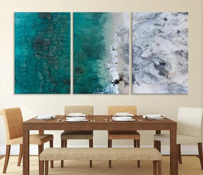 The Green Aerial Ocean Wall Art Canvas Print showcases a triptych of an aerial ocean view. Crafted on museum-quality canvas with gallery-wrapped edges and a UV-protective coating, it enhances both elegance and durability in your space.