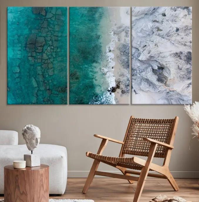 The Green Aerial Ocean Wall Art Canvas Print showcases a triptych of an aerial ocean view. Crafted on museum-quality canvas with gallery-wrapped edges and a UV-protective coating, it enhances both elegance and durability in your space.