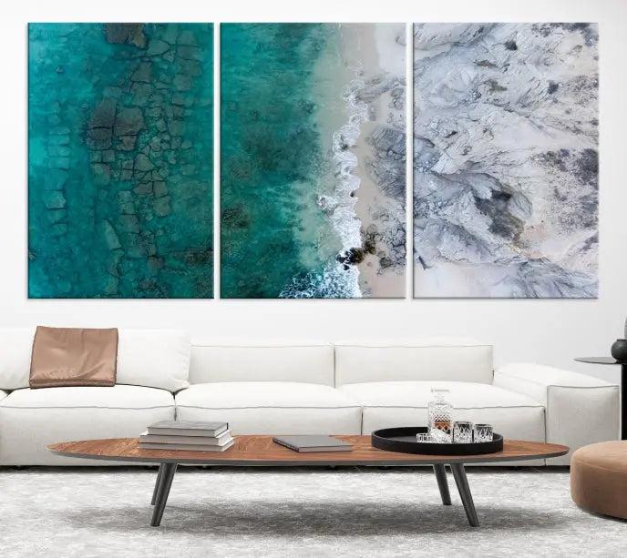 The Green Aerial Ocean Wall Art Canvas Print showcases a triptych of an aerial ocean view. Crafted on museum-quality canvas with gallery-wrapped edges and a UV-protective coating, it enhances both elegance and durability in your space.