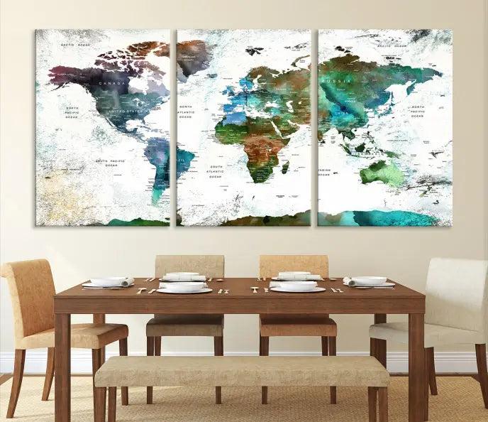 The Green Color Map of World Wall Art Canvas Print, featuring colorful continents and handmade in the USA, is displayed on the wall. These museum-quality canvases are finished with a UV-protective coating to ensure lasting vibrancy.