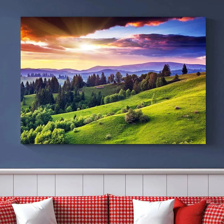 The room features a large triptych of the Green Hills and Sunset Wall Art Print, showcasing a scenic landscape with lush greenery and a vibrant sky.