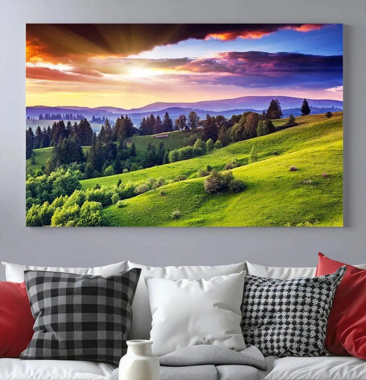 The room features a large triptych of the Green Hills and Sunset Wall Art Print, showcasing a scenic landscape with lush greenery and a vibrant sky.