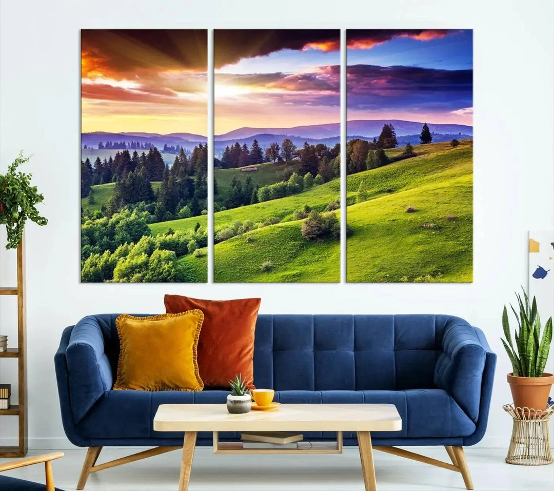 The room features a large triptych of the Green Hills and Sunset Wall Art Print, showcasing a scenic landscape with lush greenery and a vibrant sky.