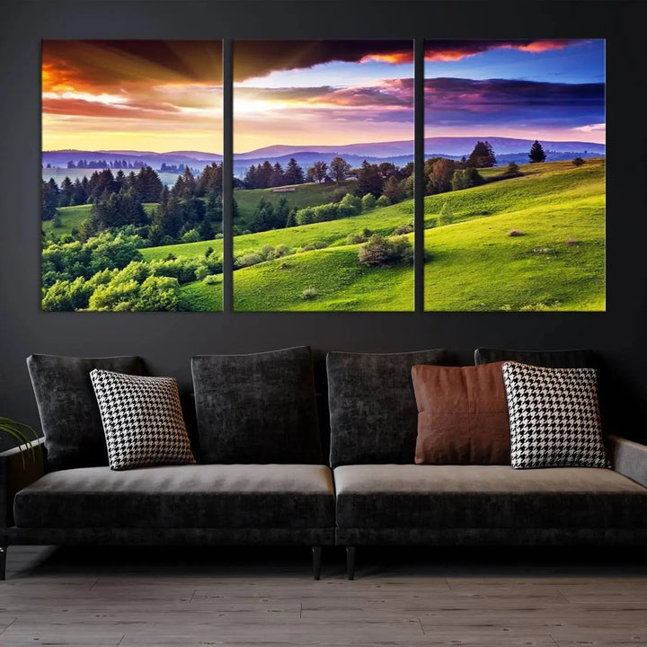 The room features a large triptych of the Green Hills and Sunset Wall Art Print, showcasing a scenic landscape with lush greenery and a vibrant sky.