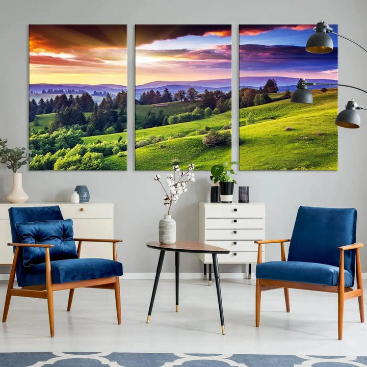 The room features a large triptych of the Green Hills and Sunset Wall Art Print, showcasing a scenic landscape with lush greenery and a vibrant sky.