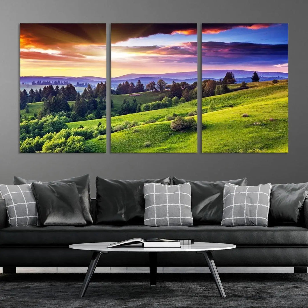 The room features a large triptych of the Green Hills and Sunset Wall Art Print, showcasing a scenic landscape with lush greenery and a vibrant sky.