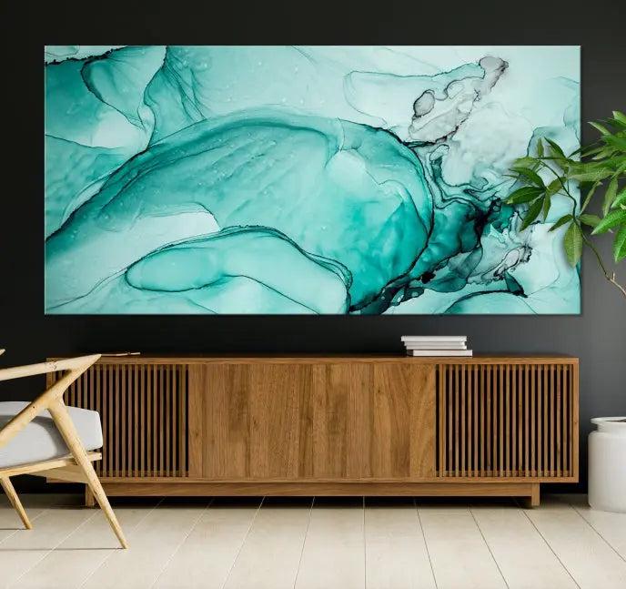 A contemporary living room showcasing the stunning "Green Marble Fluid Effect" abstract canvas, mounted prominently on the wall.