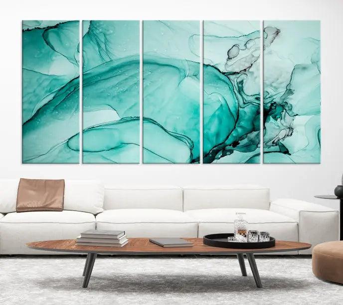 A contemporary living room showcasing the stunning "Green Marble Fluid Effect" abstract canvas, mounted prominently on the wall.