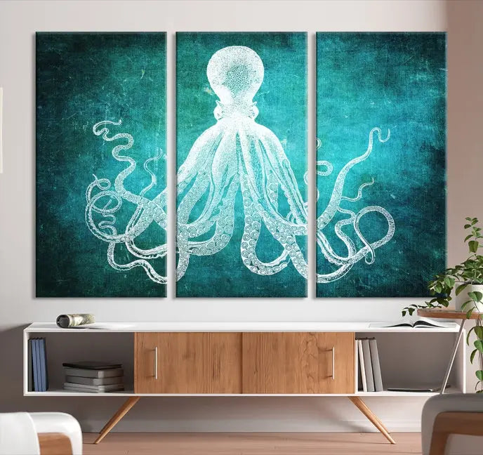 The Green Octopus Abstract Wall Art Canvas Print features a three-panel design of a white octopus on a turquoise background. It is gallery wrapped and UV-protected for durability.