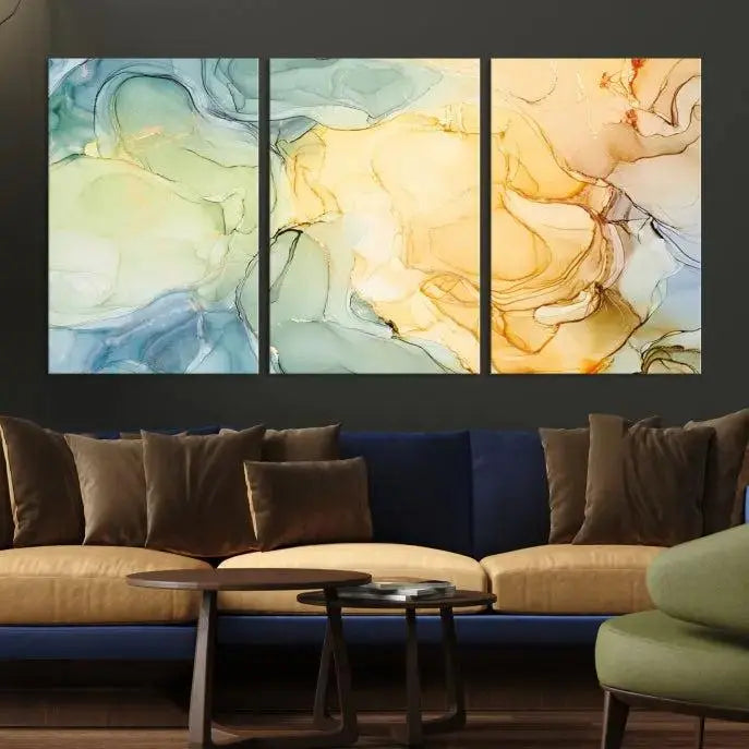 The Green and Yellow Marble Fluid Effect Wall Art Abstract Canvas Wall Art Print in the living room is a striking piece. This three-panel artwork, gallery wrapped on museum-quality canvas, ensures it stands out as a centerpiece in any setting.