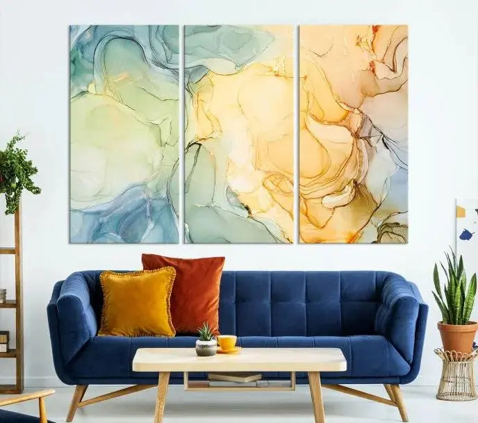 The Green and Yellow Marble Fluid Effect Wall Art Abstract Canvas Wall Art Print in the living room is a striking piece. This three-panel artwork, gallery wrapped on museum-quality canvas, ensures it stands out as a centerpiece in any setting.