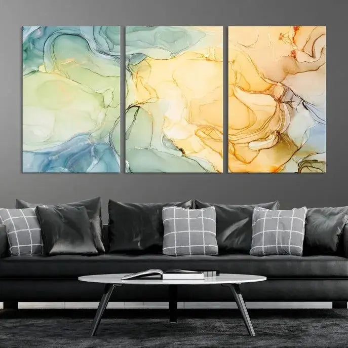 The Green and Yellow Marble Fluid Effect Wall Art Abstract Canvas Wall Art Print in the living room is a striking piece. This three-panel artwork, gallery wrapped on museum-quality canvas, ensures it stands out as a centerpiece in any setting.