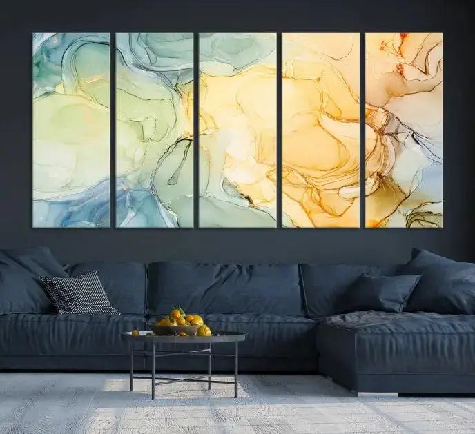 The Green and Yellow Marble Fluid Effect Wall Art Abstract Canvas Wall Art Print in the living room is a striking piece. This three-panel artwork, gallery wrapped on museum-quality canvas, ensures it stands out as a centerpiece in any setting.