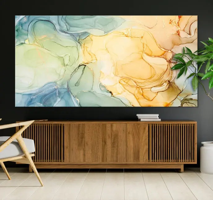 The Green and Yellow Marble Fluid Effect Wall Art Abstract Canvas Wall Art Print in the living room is a striking piece. This three-panel artwork, gallery wrapped on museum-quality canvas, ensures it stands out as a centerpiece in any setting.