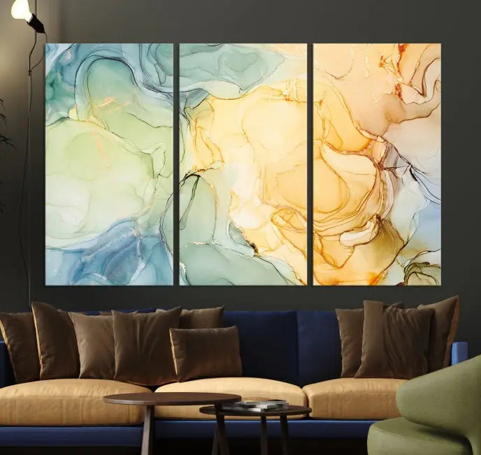 The Green and Yellow Marble Fluid Effect Wall Art Abstract Canvas Wall Art Print in the living room is a striking piece. This three-panel artwork, gallery wrapped on museum-quality canvas, ensures it stands out as a centerpiece in any setting.