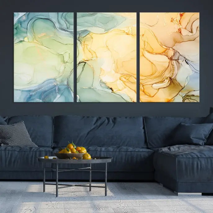 The Green and Yellow Marble Fluid Effect Wall Art Abstract Canvas Wall Art Print in the living room is a striking piece. This three-panel artwork, gallery wrapped on museum-quality canvas, ensures it stands out as a centerpiece in any setting.