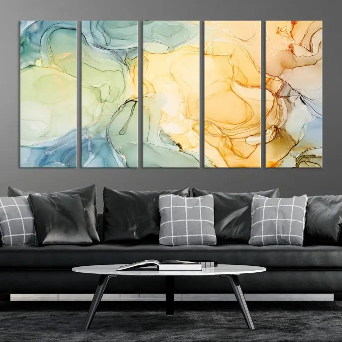 The Green and Yellow Marble Fluid Effect Wall Art Abstract Canvas Wall Art Print in the living room is a striking piece. This three-panel artwork, gallery wrapped on museum-quality canvas, ensures it stands out as a centerpiece in any setting.