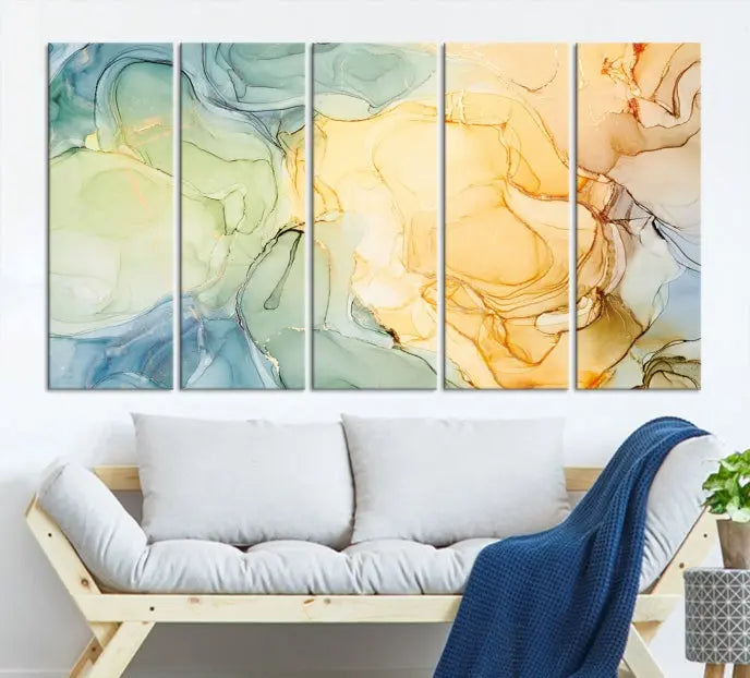 The Green and Yellow Marble Fluid Effect Wall Art Abstract Canvas Wall Art Print in the living room is a striking piece. This three-panel artwork, gallery wrapped on museum-quality canvas, ensures it stands out as a centerpiece in any setting.