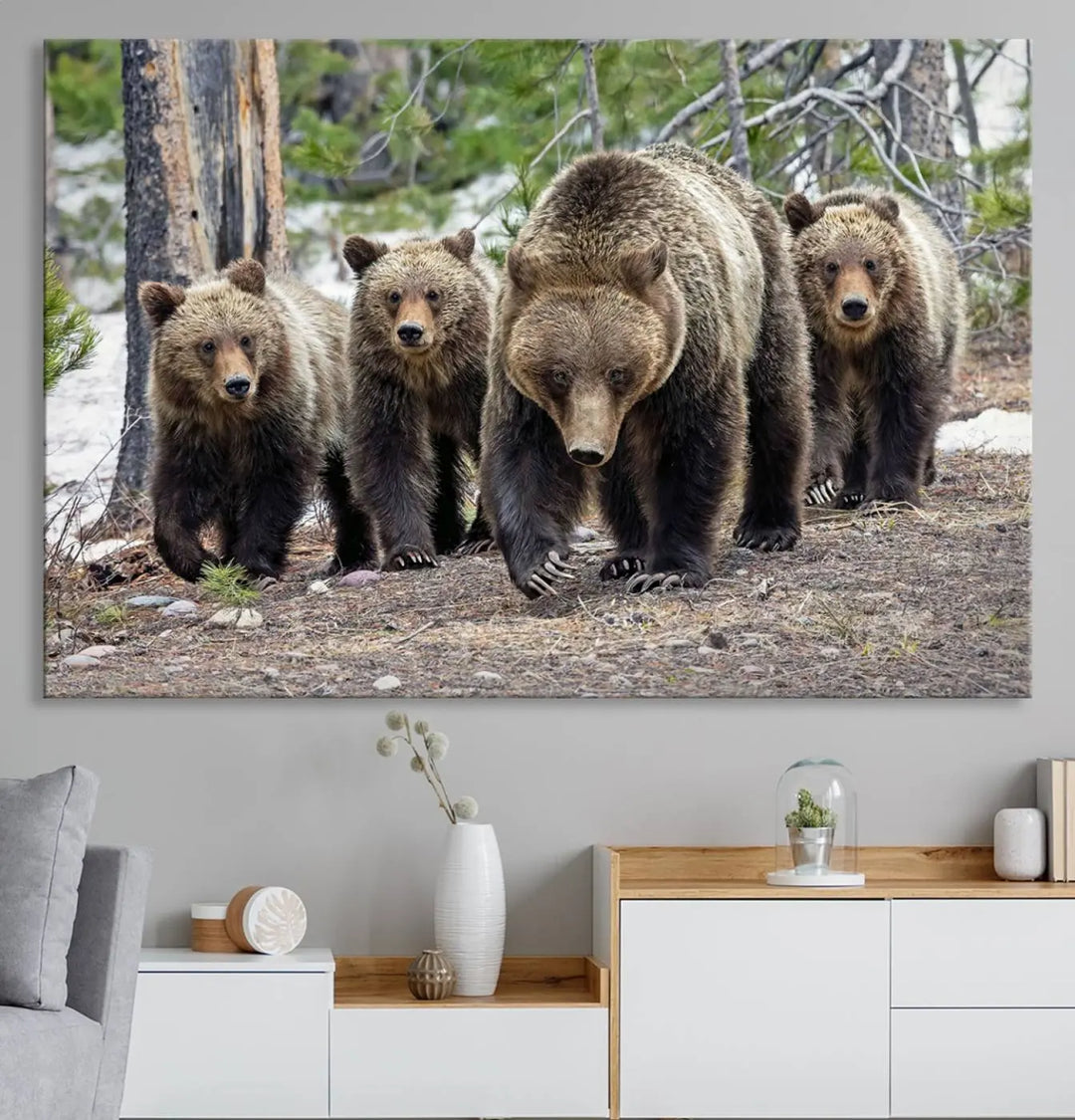 The Grizzly 399 and Cubs in Wild Flowers Wall Art Canvas Print, depicting grizzly bears amidst wildflowers, is elegantly displayed.