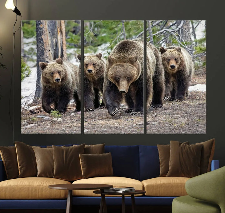 The Grizzly 399 and Cubs in Wild Flowers Wall Art Canvas Print, depicting grizzly bears amidst wildflowers, is elegantly displayed.