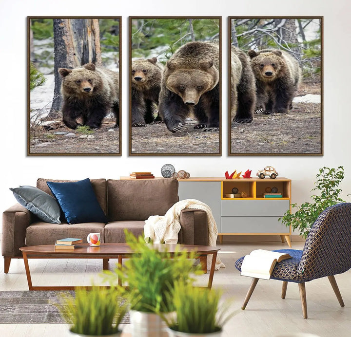 The Grizzly 399 and Cubs in Wild Flowers Wall Art Canvas Print, depicting grizzly bears amidst wildflowers, is elegantly displayed.