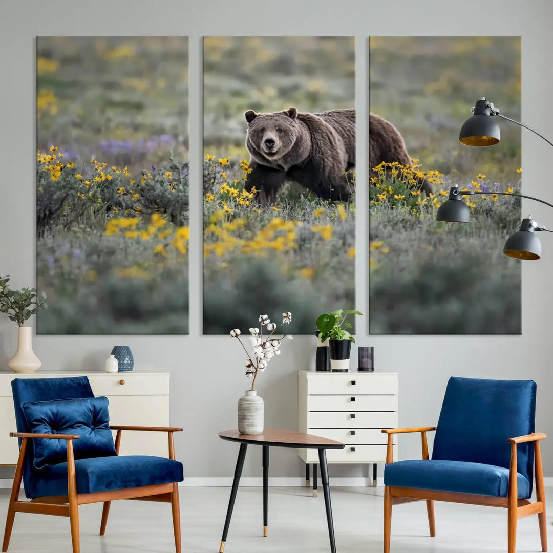 The Grizzly Bears Wall Art, titled "Grizzly 399 in Wild Flowers Wall Art Canvas Print," showcases a majestic bear meandering through vibrant yellow flowers. This piece brings the wild beauty of Grand Teton into your home.