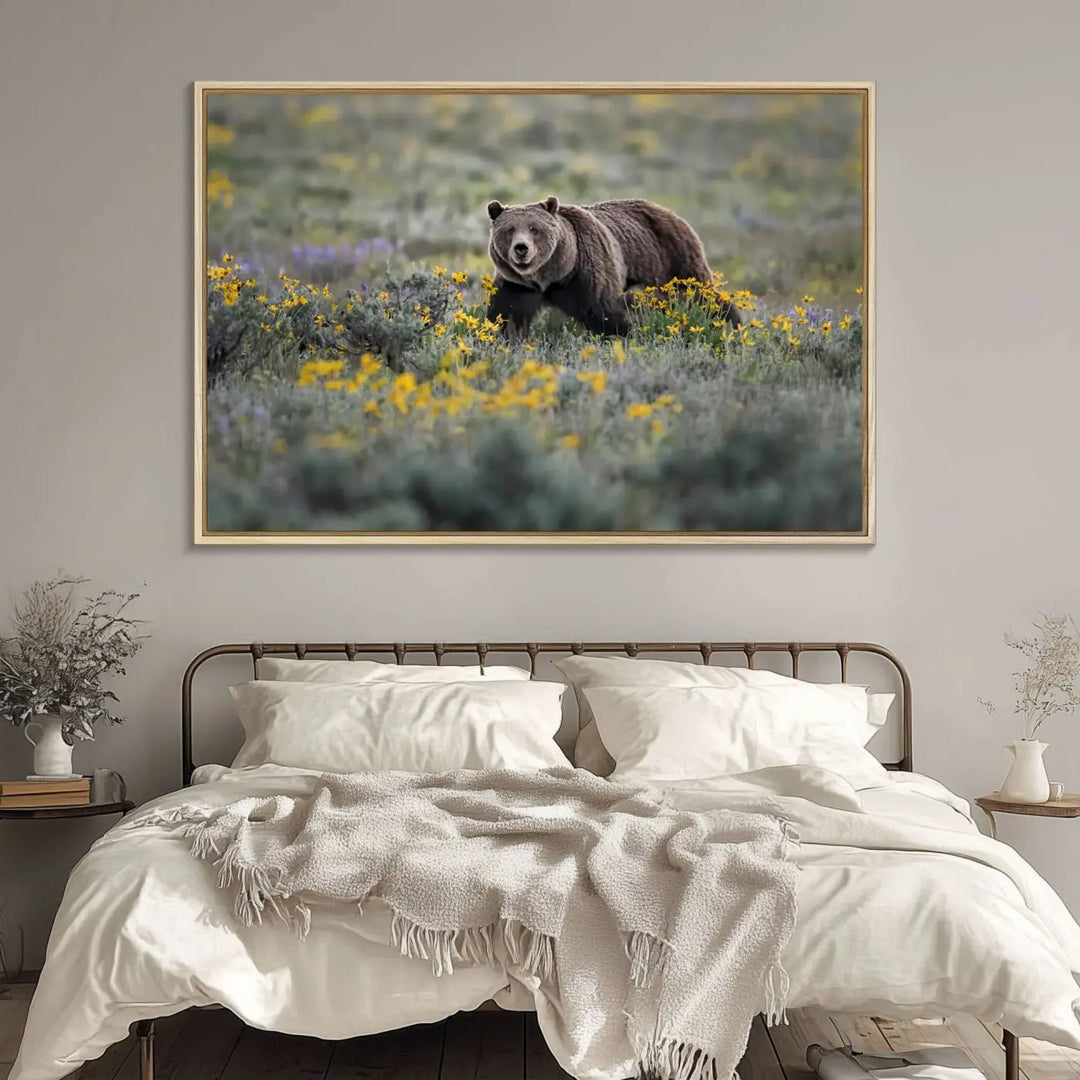 The Grizzly Bears Wall Art, titled "Grizzly 399 in Wild Flowers Wall Art Canvas Print," showcases a majestic bear meandering through vibrant yellow flowers. This piece brings the wild beauty of Grand Teton into your home.