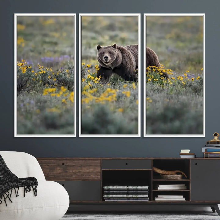 The Grizzly Bears Wall Art, titled "Grizzly 399 in Wild Flowers Wall Art Canvas Print," showcases a majestic bear meandering through vibrant yellow flowers. This piece brings the wild beauty of Grand Teton into your home.