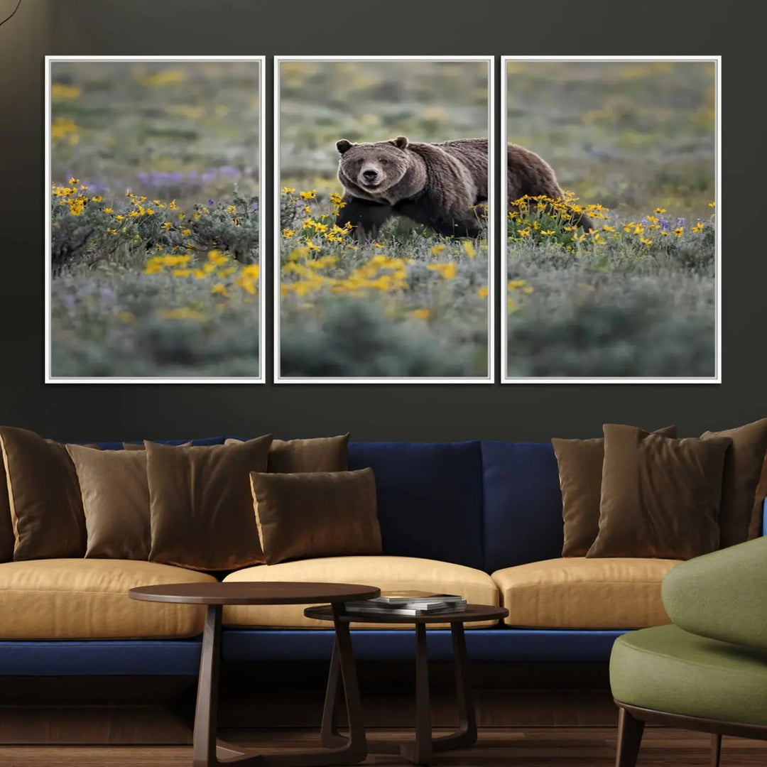 The Grizzly Bears Wall Art, titled "Grizzly 399 in Wild Flowers Wall Art Canvas Print," showcases a majestic bear meandering through vibrant yellow flowers. This piece brings the wild beauty of Grand Teton into your home.