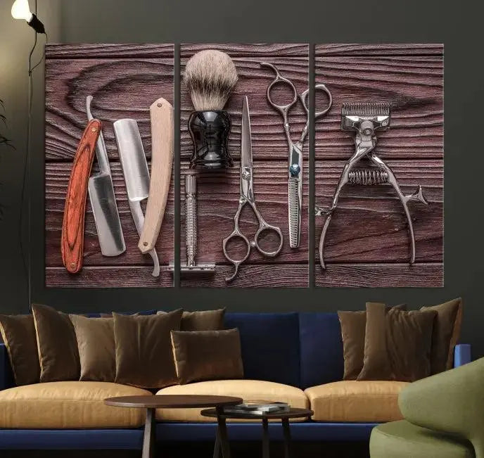 The Hairdresser Tools Wall Art Canvas Print, presented in three panels, showcases vintage barber tools against a wood grain backdrop.