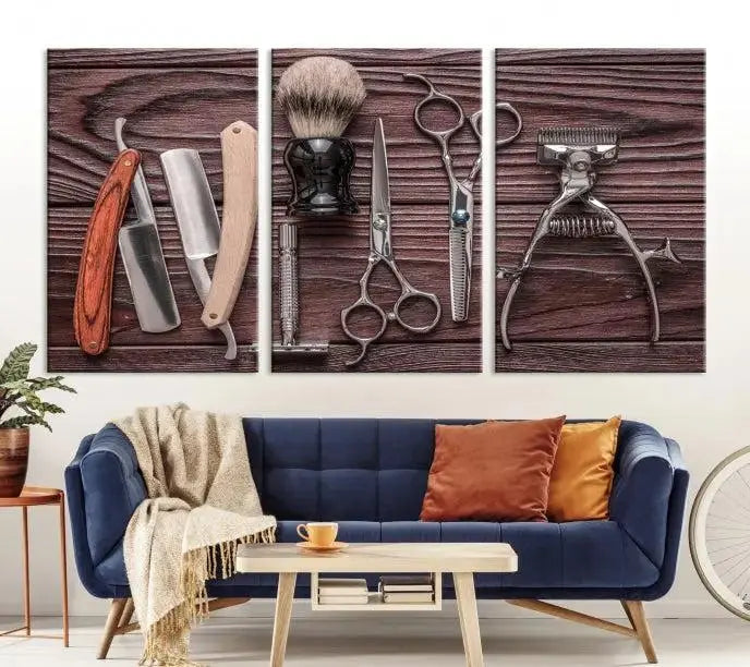 The Hairdresser Tools Wall Art Canvas Print, presented in three panels, showcases vintage barber tools against a wood grain backdrop.