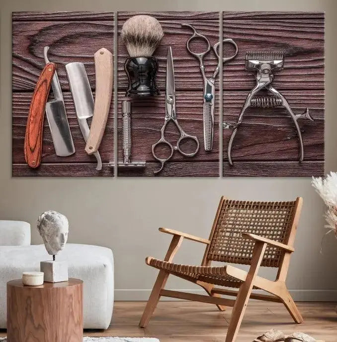 The Hairdresser Tools Wall Art Canvas Print, presented in three panels, showcases vintage barber tools against a wood grain backdrop.