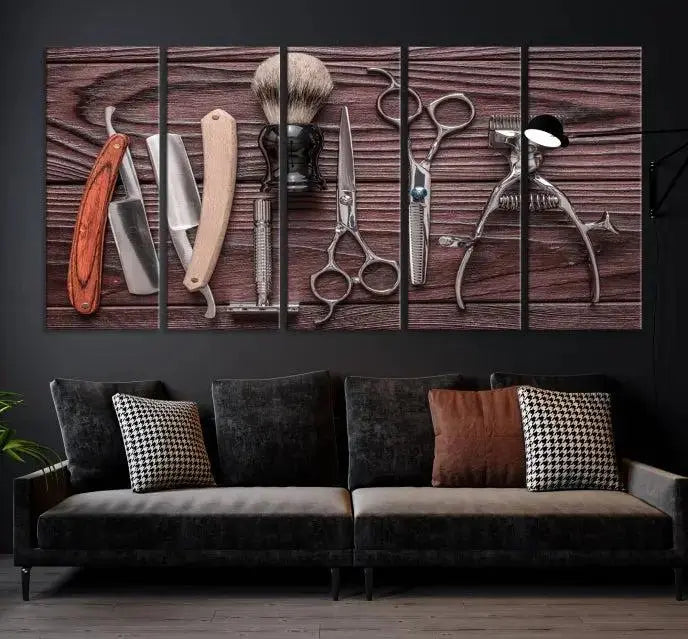 The Hairdresser Tools Wall Art Canvas Print, presented in three panels, showcases vintage barber tools against a wood grain backdrop.