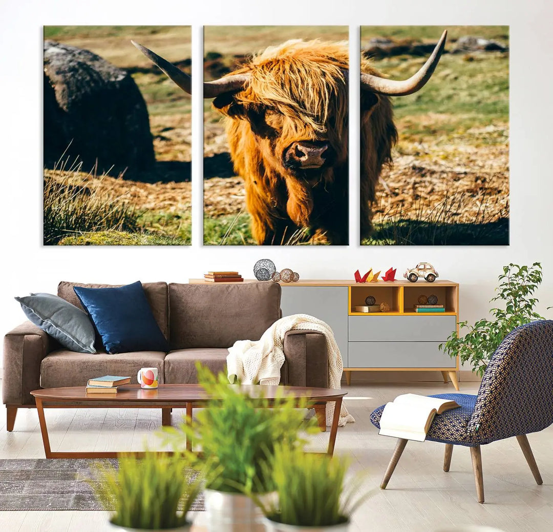 The living room features the Highland Cow Canvas Wall Art, a triptych printed on museum-quality canvas, displayed gracefully above.