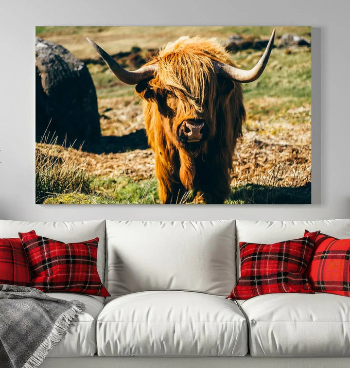 The living room features the Highland Cow Canvas Wall Art, a triptych printed on museum-quality canvas, displayed gracefully above.