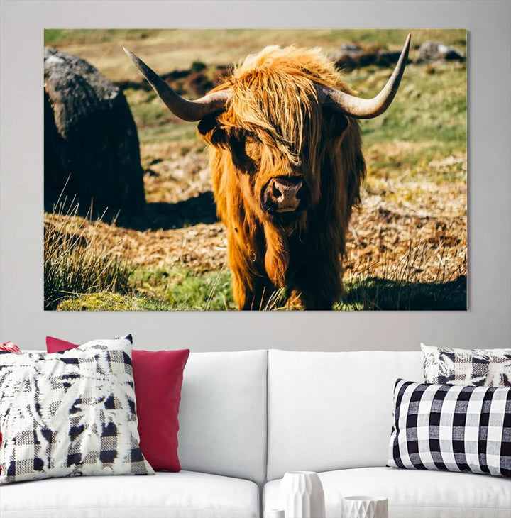 The living room features the Highland Cow Canvas Wall Art, a triptych printed on museum-quality canvas, displayed gracefully above.