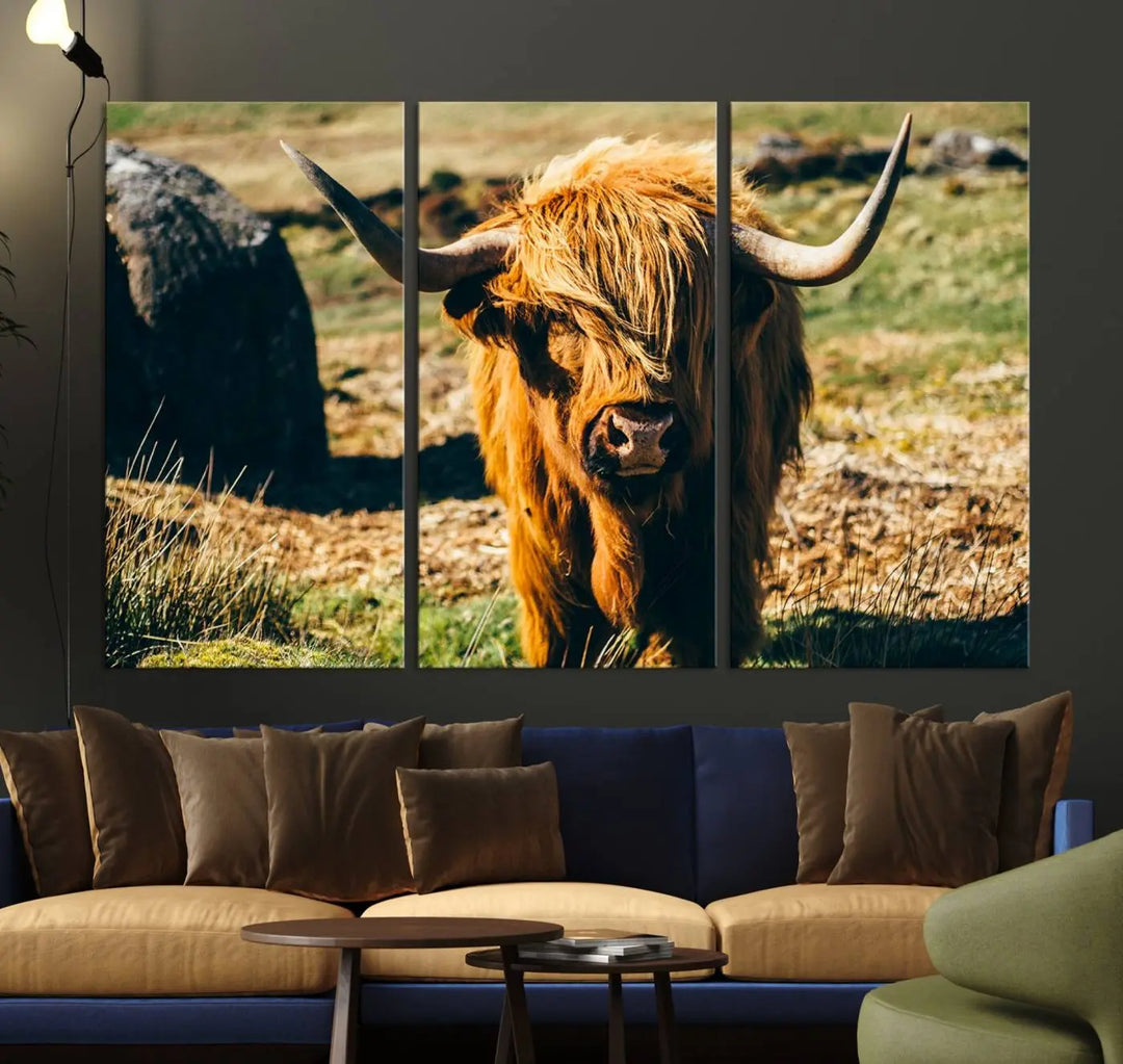 The living room features the Highland Cow Canvas Wall Art, a triptych printed on museum-quality canvas, displayed gracefully above.