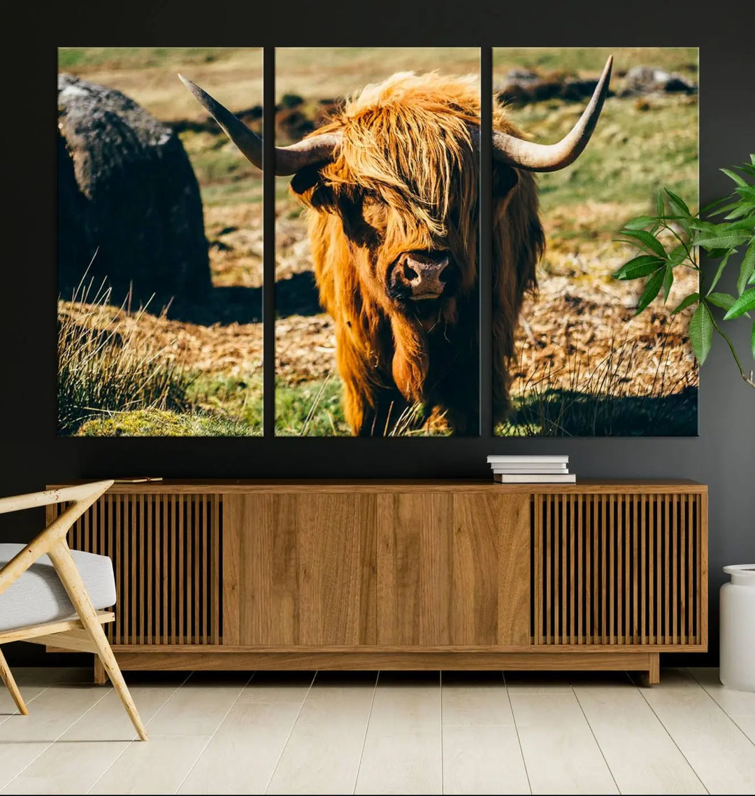 The living room features the Highland Cow Canvas Wall Art, a triptych printed on museum-quality canvas, displayed gracefully above.