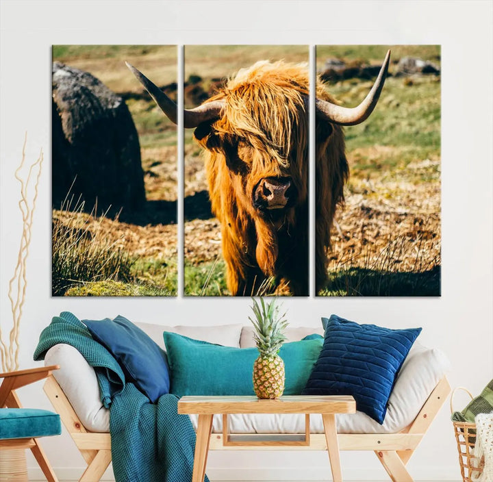 The living room features the Highland Cow Canvas Wall Art, a triptych printed on museum-quality canvas, displayed gracefully above.