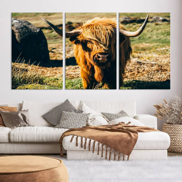 The living room features the Highland Cow Canvas Wall Art, a triptych printed on museum-quality canvas, displayed gracefully above.