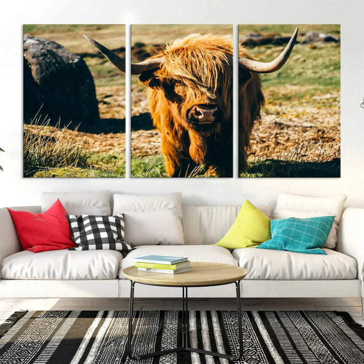 The living room features the Highland Cow Canvas Wall Art, a triptych printed on museum-quality canvas, displayed gracefully above.