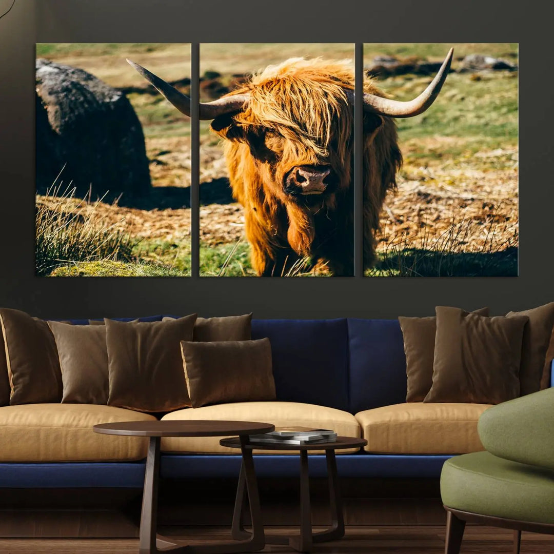 The living room features the Highland Cow Canvas Wall Art, a triptych printed on museum-quality canvas, displayed gracefully above.