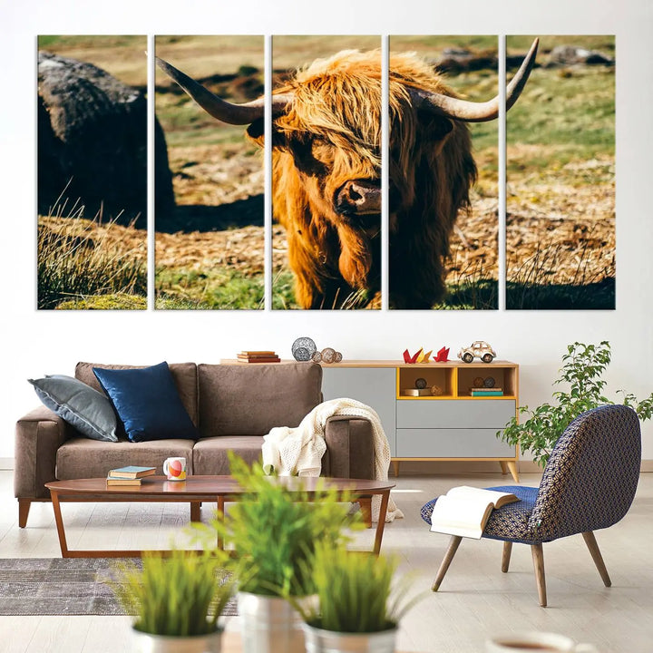 The living room features the Highland Cow Canvas Wall Art, a triptych printed on museum-quality canvas, displayed gracefully above.