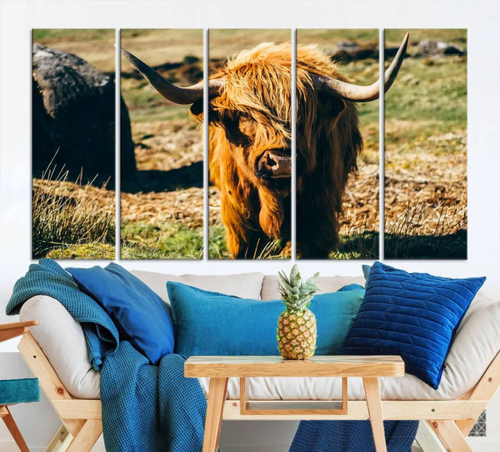 The living room features the Highland Cow Canvas Wall Art, a triptych printed on museum-quality canvas, displayed gracefully above.