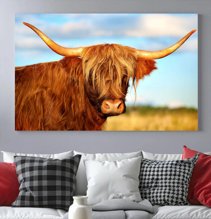 A triptych of Highland Cow Canvas Wall Art Print Cattle Art, featuring a shaggy-haired highland cow with long horns, elegantly adorns the space. Each museum-quality canvas piece is professionally hand-assembled and includes a UV-protective coating to maintain its vibrant colors over time.