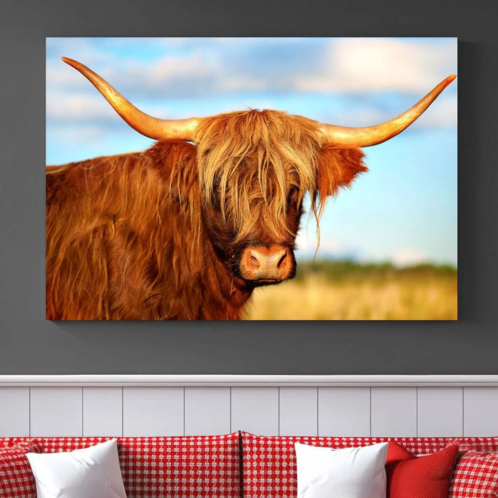 A triptych of Highland Cow Canvas Wall Art Print Cattle Art, featuring a shaggy-haired highland cow with long horns, elegantly adorns the space. Each museum-quality canvas piece is professionally hand-assembled and includes a UV-protective coating to maintain its vibrant colors over time.