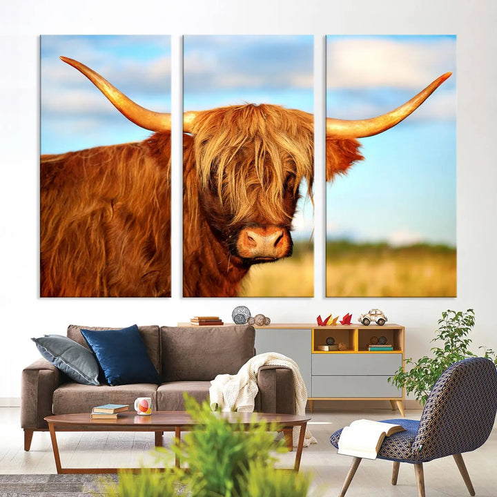 A triptych of Highland Cow Canvas Wall Art Print Cattle Art, featuring a shaggy-haired highland cow with long horns, elegantly adorns the space. Each museum-quality canvas piece is professionally hand-assembled and includes a UV-protective coating to maintain its vibrant colors over time.