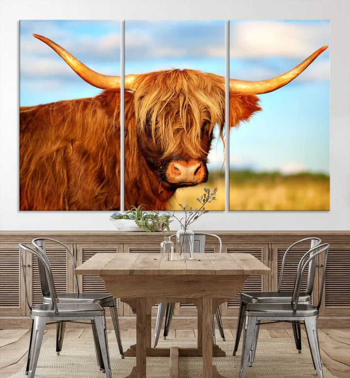 A triptych of Highland Cow Canvas Wall Art Print Cattle Art, featuring a shaggy-haired highland cow with long horns, elegantly adorns the space. Each museum-quality canvas piece is professionally hand-assembled and includes a UV-protective coating to maintain its vibrant colors over time.